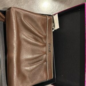 Brand new Coach Wristlet. Chocolate Brown.